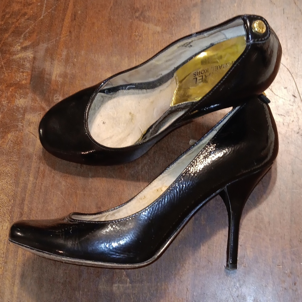 Worn Michael kors heels.